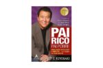 Capa do livro “Pai Rico, Pai Pobre” de Robert T. Kiyosaki, com a imagem do autor sorrindo, ao lado do título em destaque. Edição comemorativa de 20 anos, atualizada e ampliada, com foco em educação financeira e o que os ricos ensinam a seus filhos sobre dinheiro.