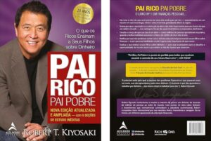 Capa do livro “Pai Rico, Pai Pobre” de Robert T. Kiyosaki, com a imagem do autor sorrindo, ao lado do título em destaque. Edição comemorativa de 20 anos, atualizada e ampliada, com foco em educação financeira e o que os ricos ensinam a seus filhos sobre dinheiro.